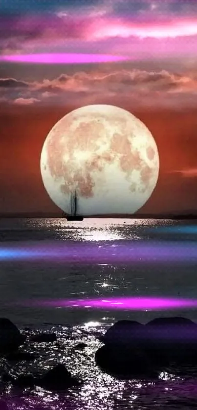 Full moon over serene ocean at night.