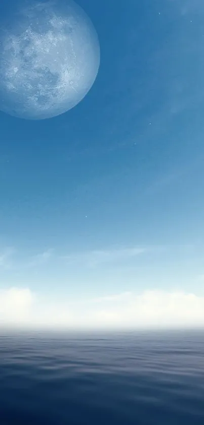 Moonlit ocean under a clear blue sky, creating a serene scene.