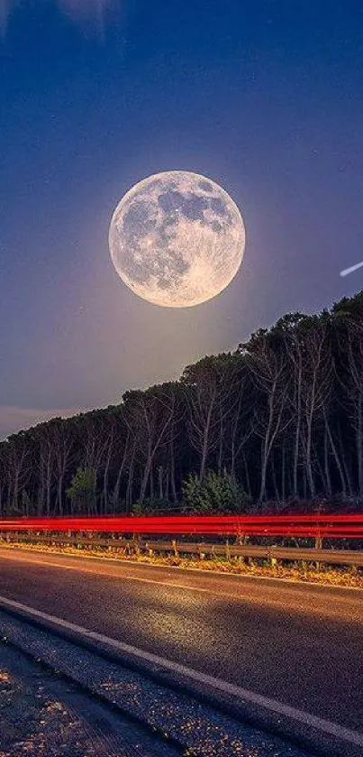 Moonlit road with forest under a full moon in the night sky.