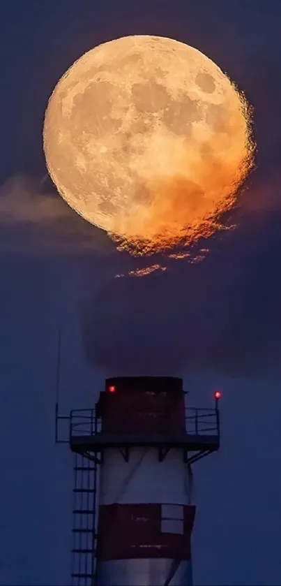 Full moon glowing over industrial smokestack against a twilight sky.