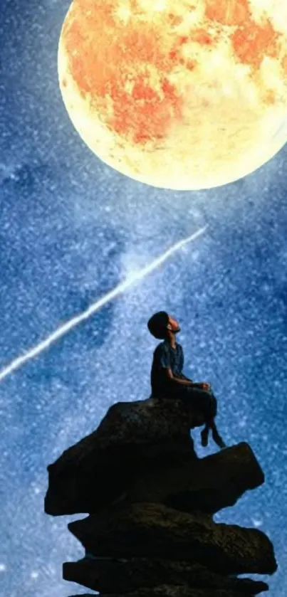 Person stargazing atop rocks under a full moon in a starry night sky.