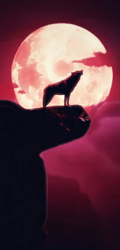 Wolf silhouette on cliff against a full crimson moon.