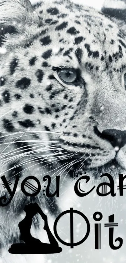 Leopard with motivational text in a snowy background.