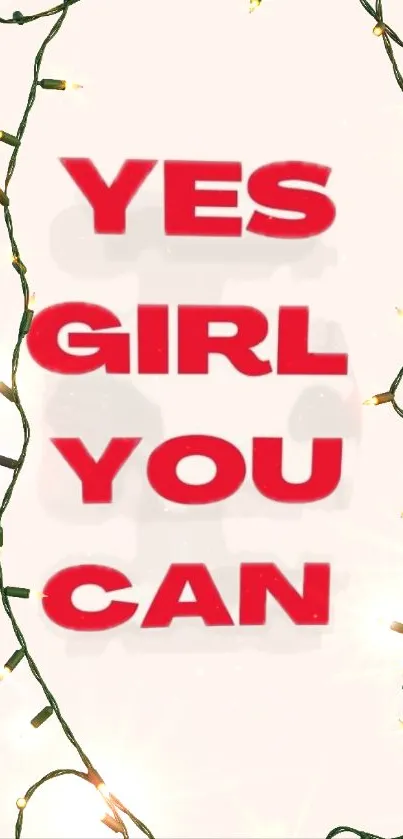 Motivational wallpaper with quote 'Yes Girl You Can' and festive lights.