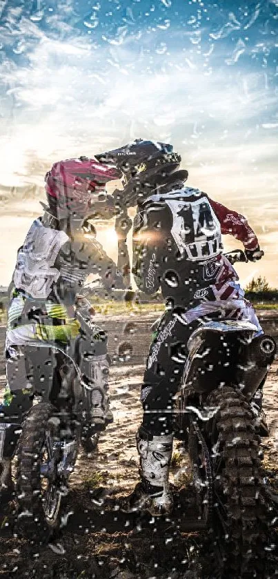 Two bikers on dirt bikes at sunset, embracing the thrill of motocross.