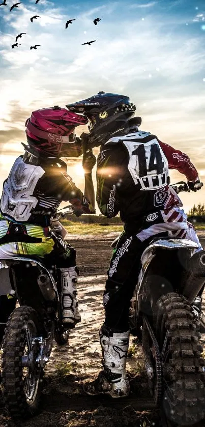 Motocross couple under a sunset sky with birds. Perfect adventure scene.