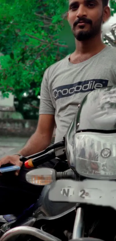 Young man on motorcycle in urban setting.