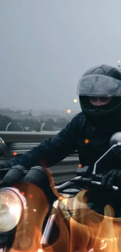 Motorcyclist rides through vibrant flames on a scenic road.