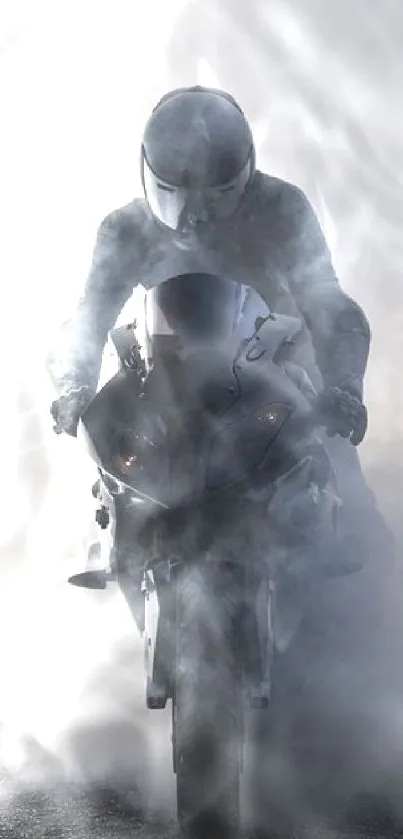 Motorcycle rider in dramatic smoke effect wallpaper.