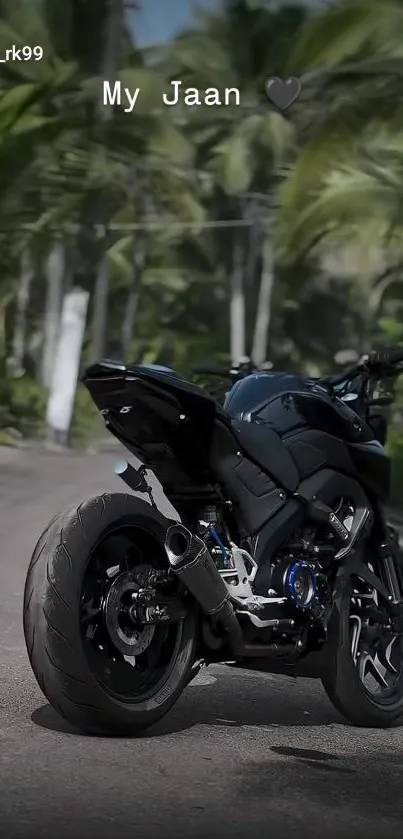 A motorcycle parked on a tropical road with lush greenery surrounding it.