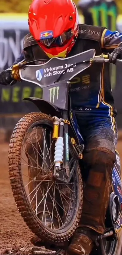 Motorcycle rider racing on a dirt track.
