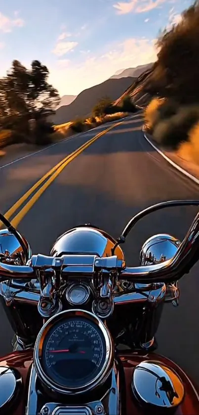 Motorcycle ride at sunset along a winding road with scenic views.