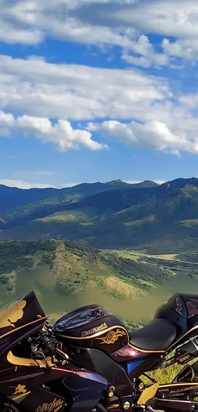 Motorcycle with scenic mountain landscape under a vibrant blue sky.