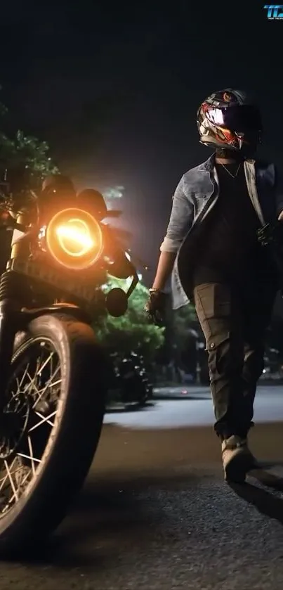 Motorcyclist walking beside a bike at night with streetlights.