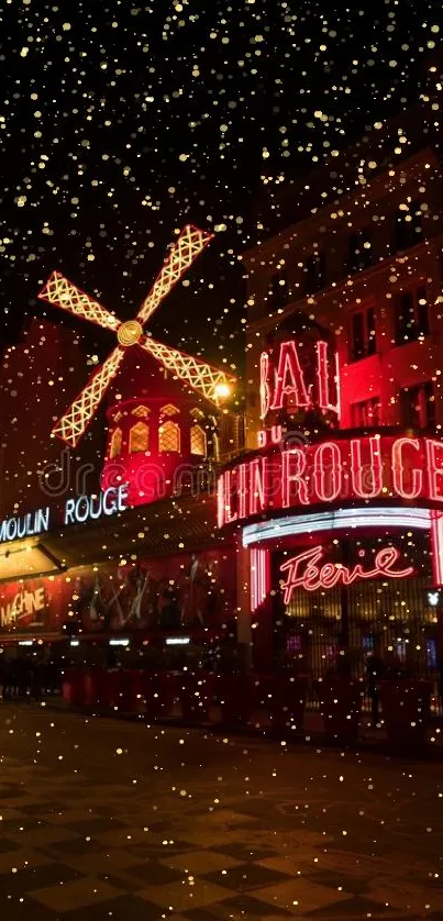 Moulin Rouge building with neon lights at night.