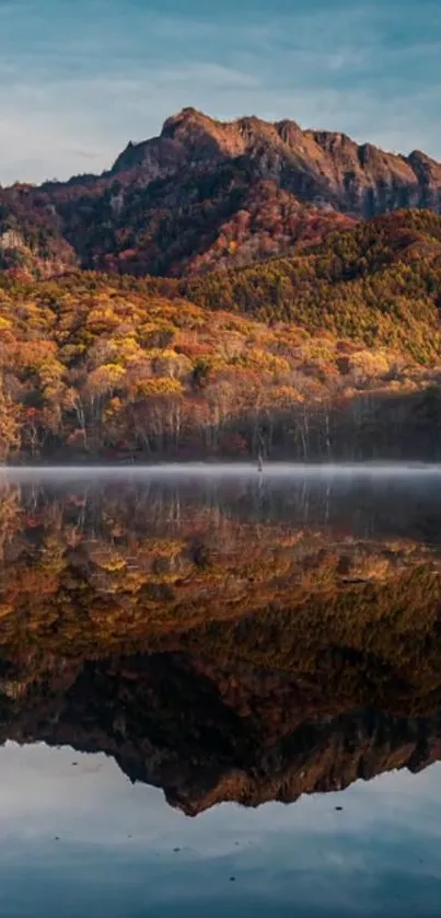 Autumn mountains with lake reflection