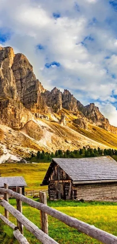 Mountain cabin with rocky peaks and blue sky in vibrant landscape.