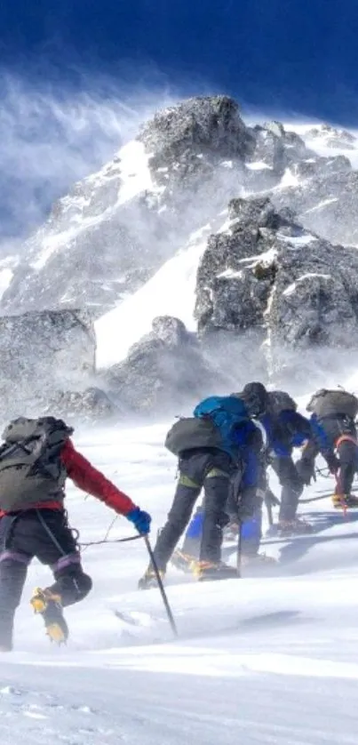 Climbers ascending a snowy mountain peak in a breathtaking landscape.