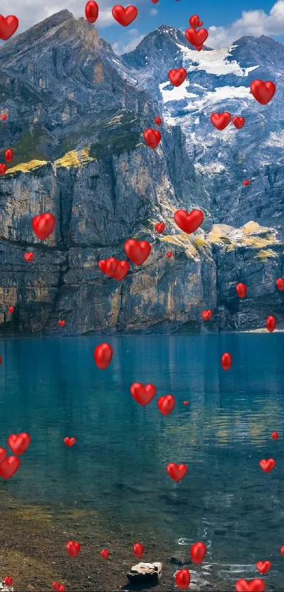 Mountain lake with floating red hearts wallpaper.