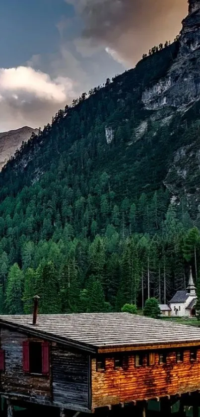 Tranquil mountain lake cabin with lush forest and calm waters.