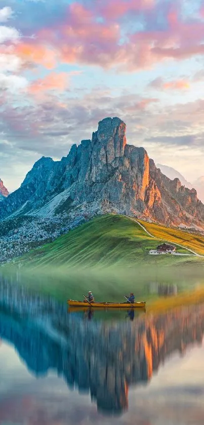 Serene mountain lake reflection with colorful sunset sky.