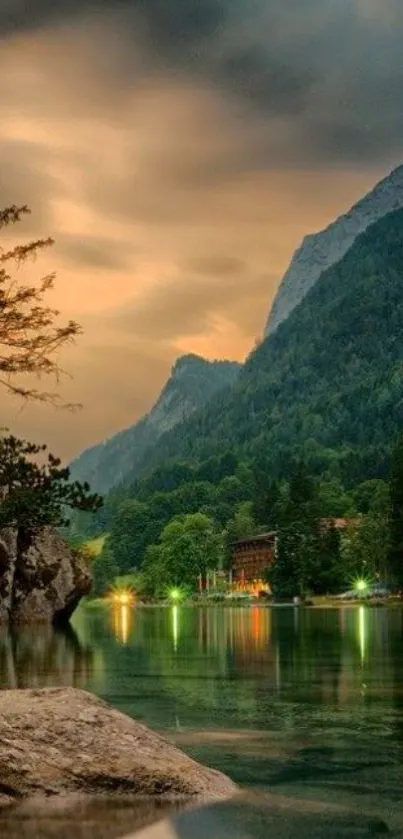 Beautiful sunset view over tranquil mountain lake with glowing reflections.