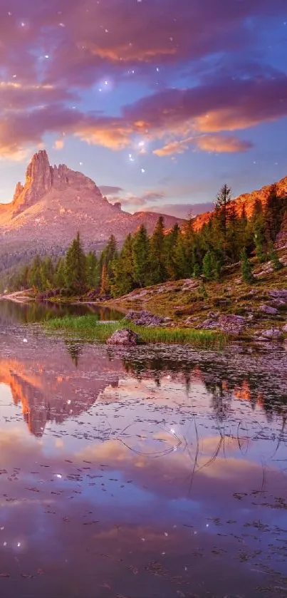 Mountain lake at sunset with purple hues and reflection.