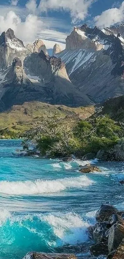 Tranquil mountain lake under a blue sky with scenic peaks.