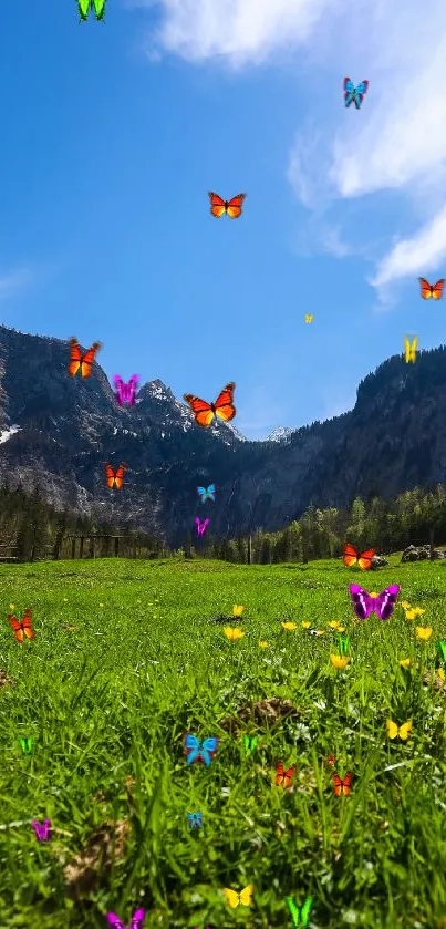 Vibrant green meadow under a blue sky with mountains in the background.