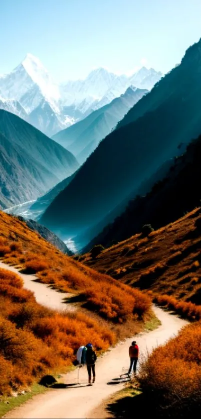 Mountain trail with hikers in vibrant autumn scenery.