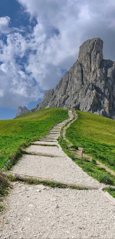 Path leading up a mountain under a blue sky.