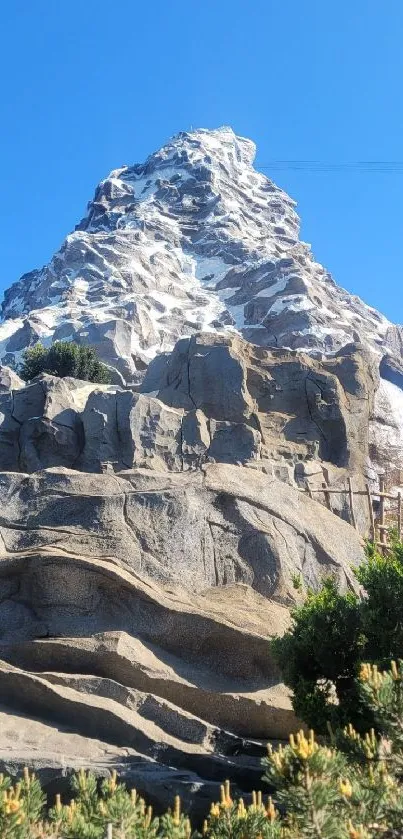 Serene mountain peak under blue sky.