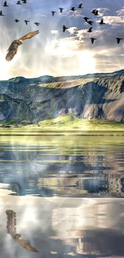 Mountain lake with bird flocks reflected on tranquil water.