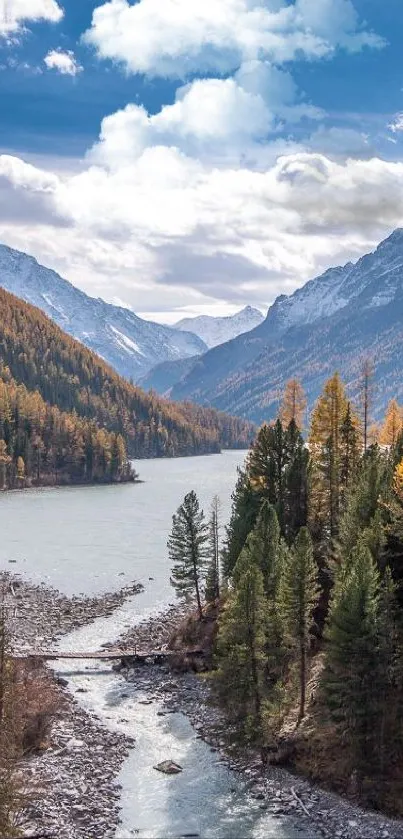 Scenic mountain river and autumn trees under a clear blue sky.