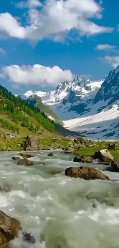 River flowing through mountains under blue sky.