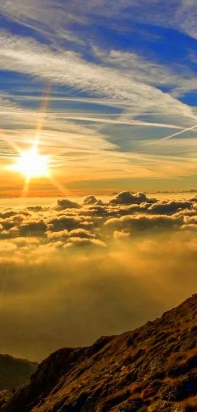 Stunning sunrise over mountains with golden clouds and blue sky.