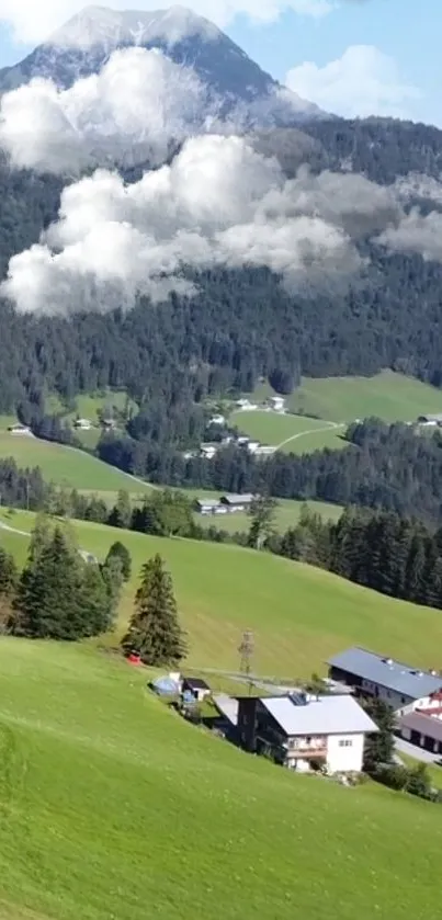 Scenic mountain valley with lush greenery and clouds.