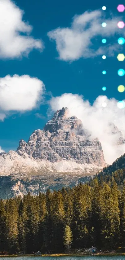 Mountain vista with blue sky and lush forest wallpaper