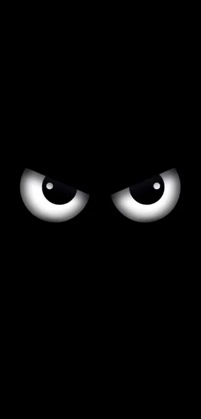 A pair of intense, mysterious eyes on a black background.