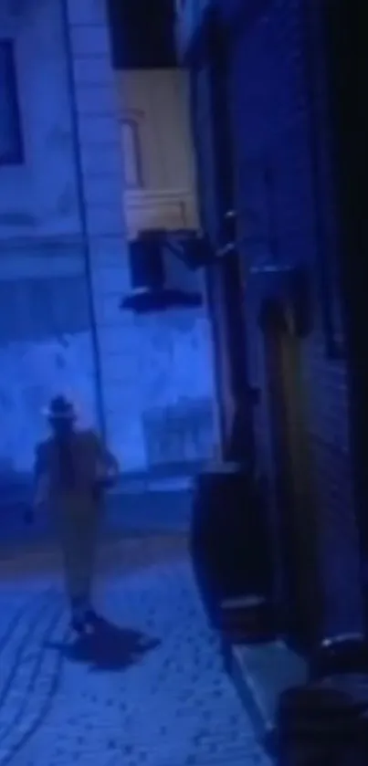 Mysterious figure walks on a dim, blue-lit street.