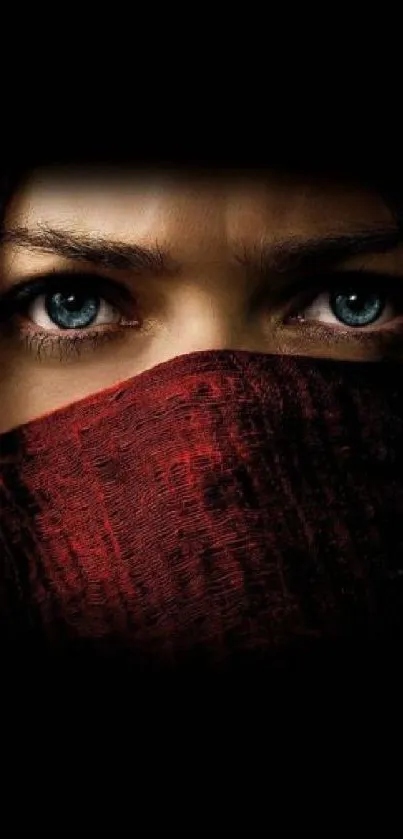 Wallpaper featuring mysterious eyes and red fabric on a dark background.