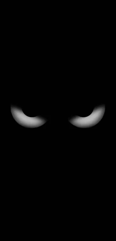 Dark wallpaper with minimalist glowing eyes.