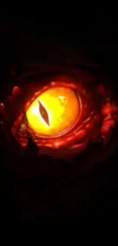 Mysterious fiery eye on dark background wallpaper.