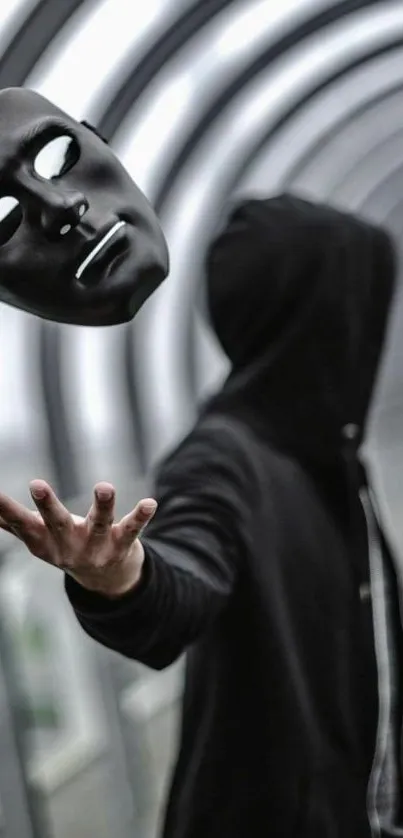 Hooded figure tosses black mask, creating a mysterious vibe.