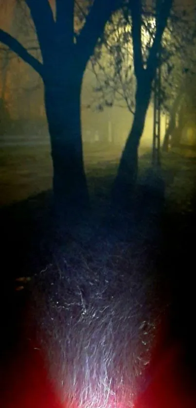 Mysterious foggy path with eerie lighting in nighttime setting.