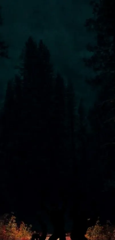 Nighttime forest with dark silhouettes of trees and figures.