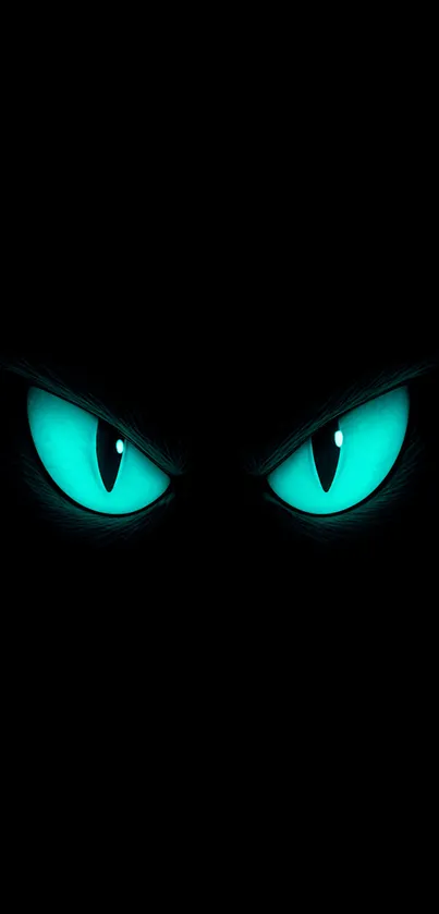 Glowing teal eyes on a dark background wallpaper.