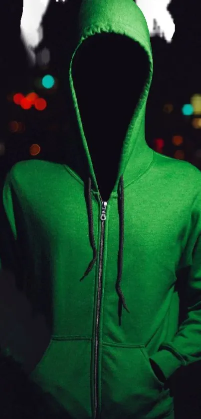 A mysterious figure in a green hoodie under city lights.