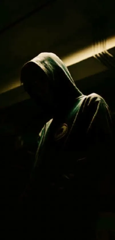 Mysterious hooded figure in dark shadows for mobile wallpaper.