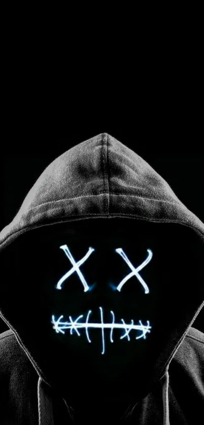 Mysterious hooded figure with glowing mask on a dark background.